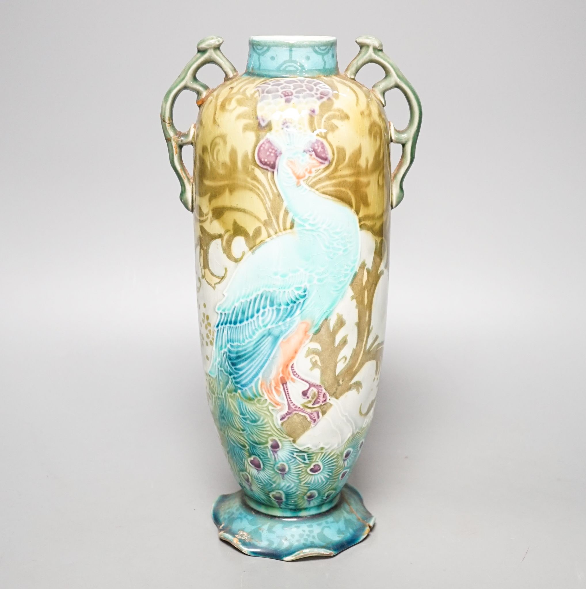 An Art Nouveau/Secessionist style Mintons ‘peacock’ vase (a.f.) 29cm